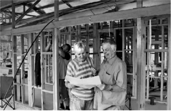 This image has an empty alt attribute; its file name is discussing-the-plan-1.png